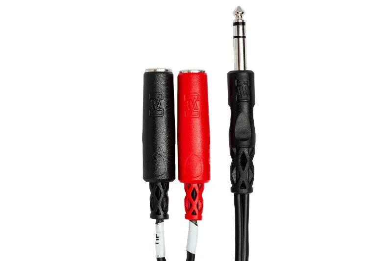Hosa stereo breakout cable: 1/4 in TRS male to two 1/4 in TS female jacks, red and black.