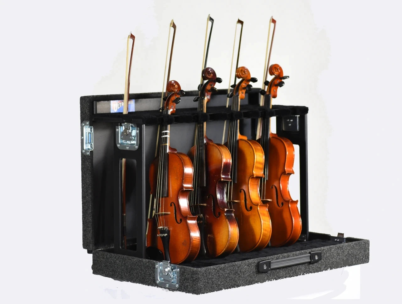 Ultra Case GSX-4 Guitar Boat Stand in a foam-lined black case holding five brown violins and bows