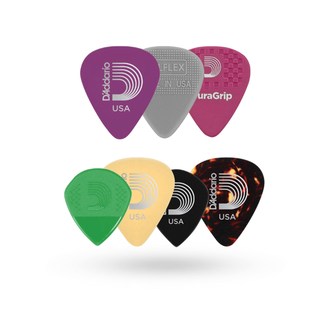 Set of guitar picks with D'Addario branding on a clear background