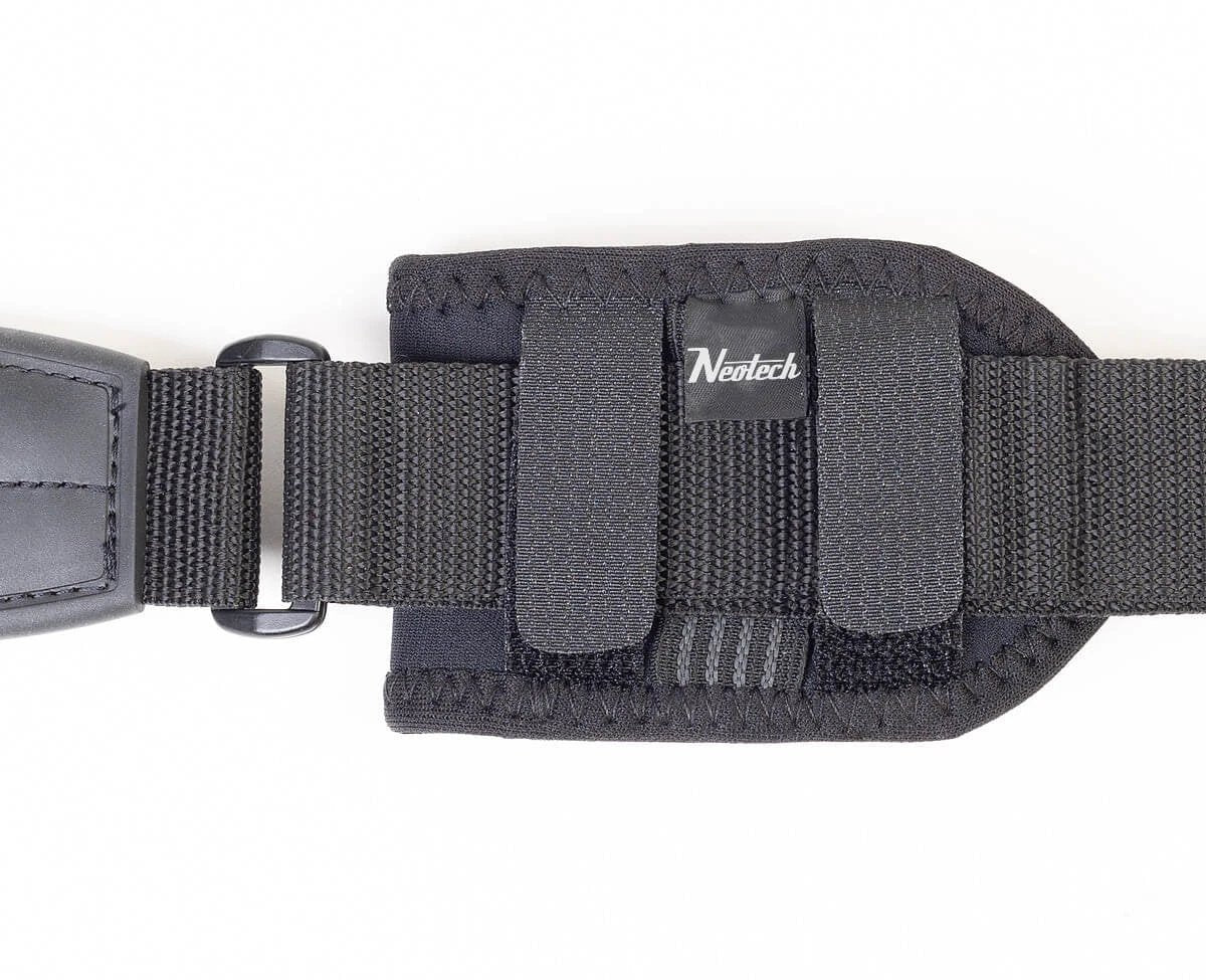 Black strap for wireless pouch with neotech logo on a white background