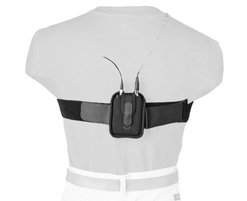 Back view of a person wearing a black belt with wireless electronic devices on a white background