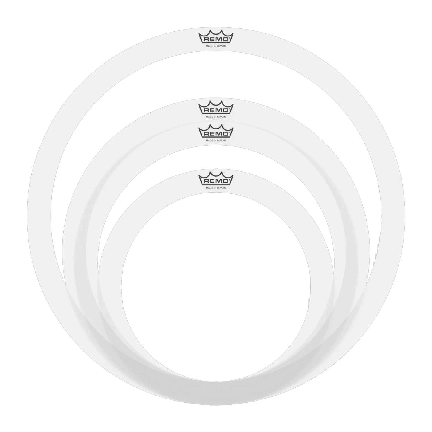 Three white drum heads with Remo logo on a white background