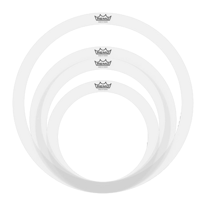 Three white drum heads with Remo logo on a white background