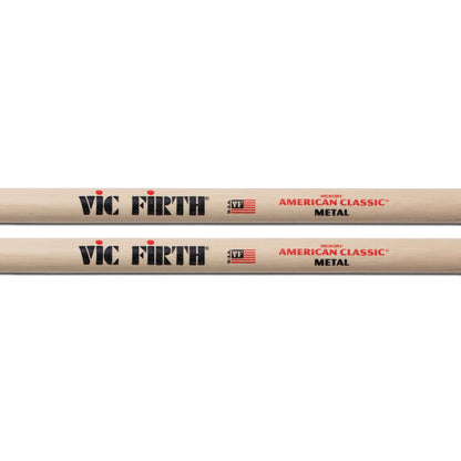 Two Vic Firth drumsticks on a white background