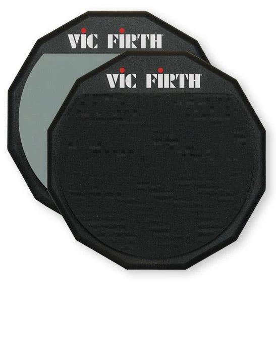 Three black Vic Firth practice pads stacked on a white background