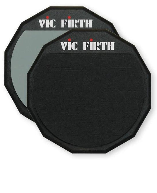 Three black Vic Firth practice pads stacked on a white background