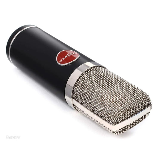 Black studio microphone with silver mesh and red label on a white background