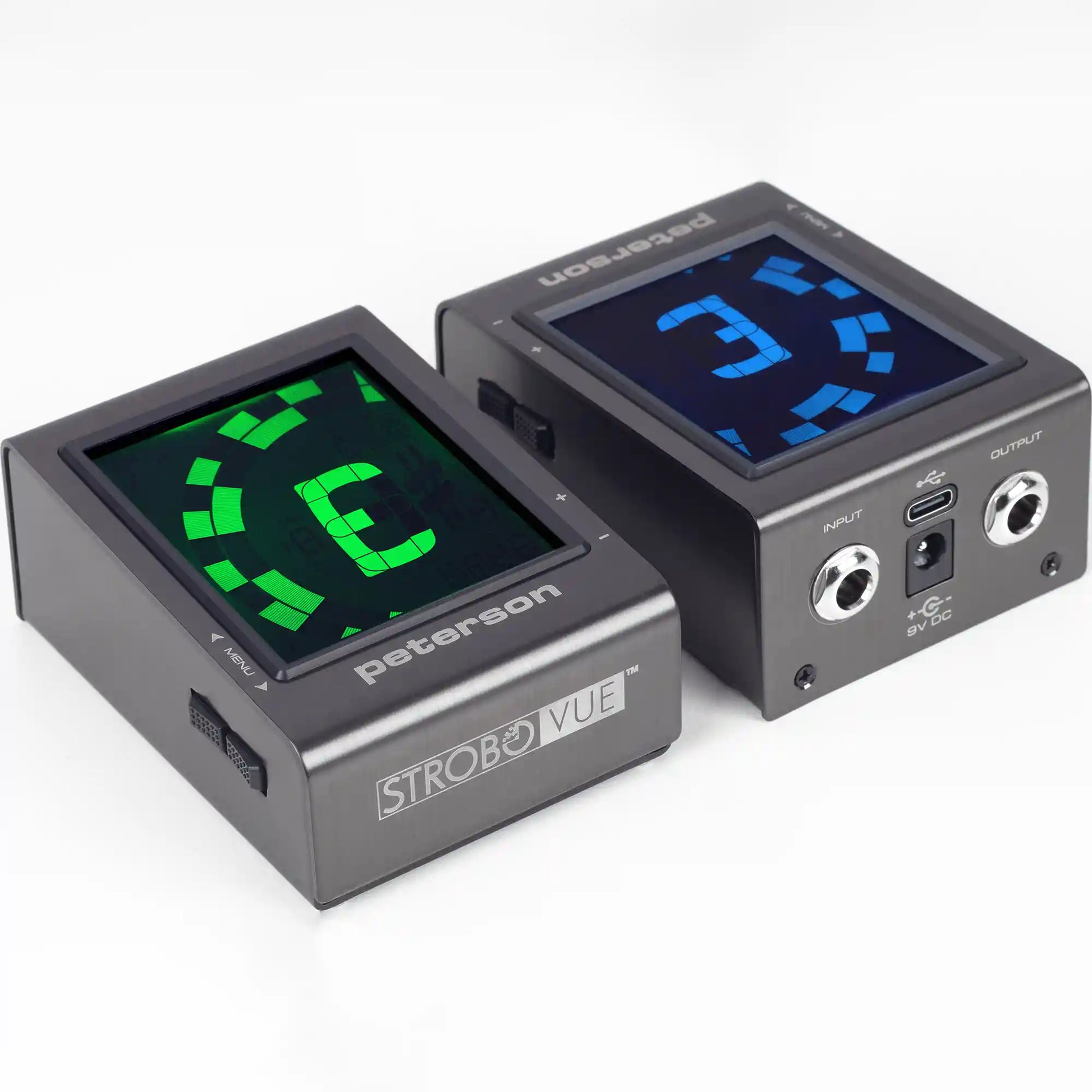 Two Peterson Strobovue electronic signal generators shown on a clean white background. The unit on the left features a green digital display, while the unit on the right shows a blue display and reveals its rear ports including input, AC, output, and USB-C.